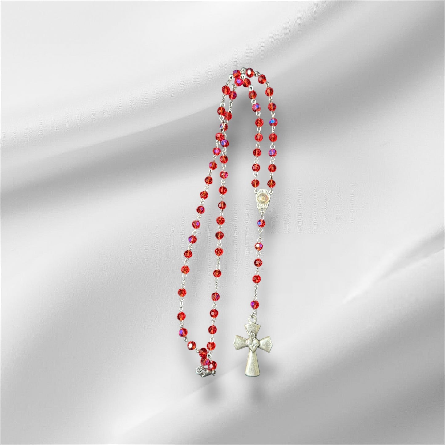 Rosarios con cruz con corazón
